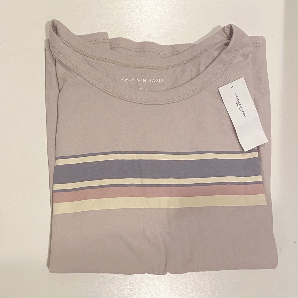 American eagle light purple top. striped design is only on front.